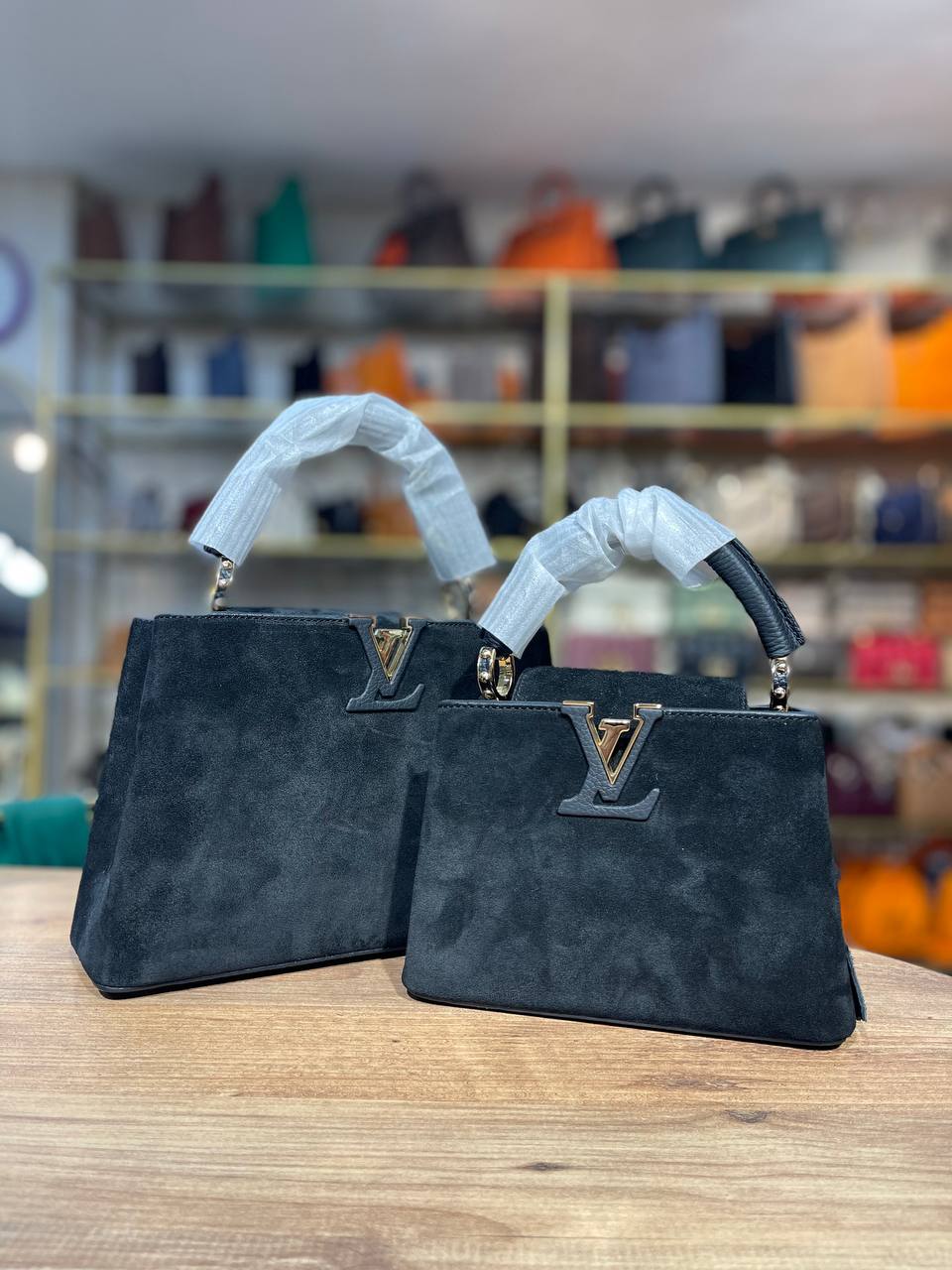 LOUIS VUITTON Capucines Bag