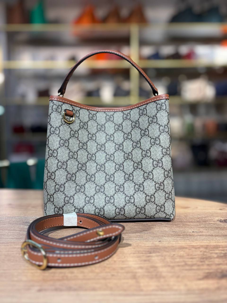 GUCCI Emblem Bucket Bag – Patterned Leather